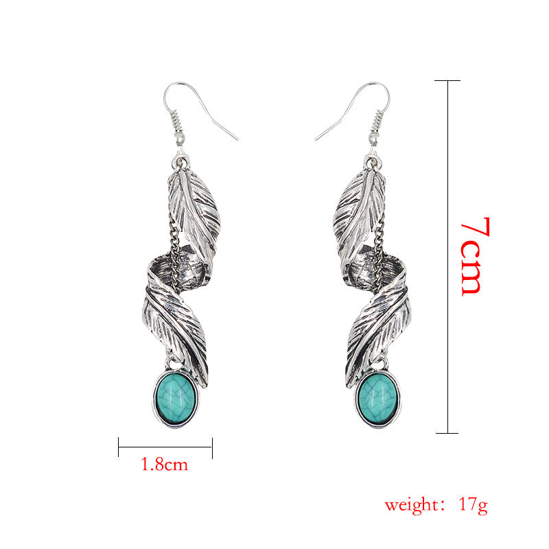 Boucles d'Oreilles Plumes Torsadées avec Crochets en Turquoise Synthétique - Alliage de Zinc Sans Plomb ni Cadmium - Taille 70x18mm